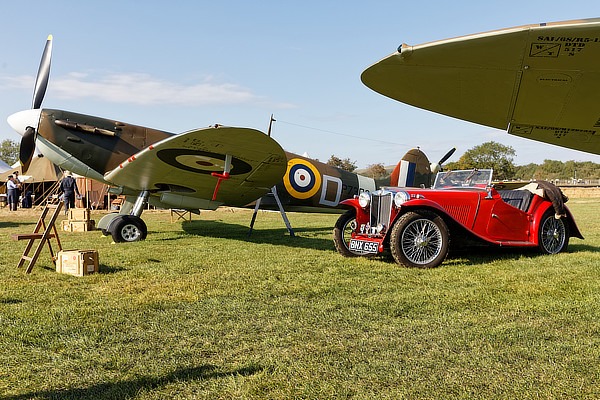 Spitfire and car at Westhampnett